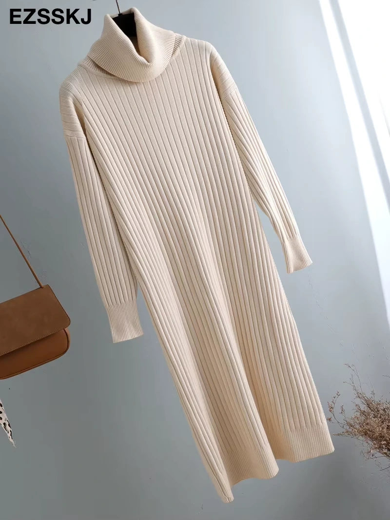 Cream turtleneck straight knit midi jumper dress hanging against a light background — view 40 — view 45