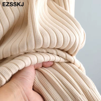 Ribbed texture close up of a women's turtleneck straight knit midi jumper dress in light beige — view 43 — view 48