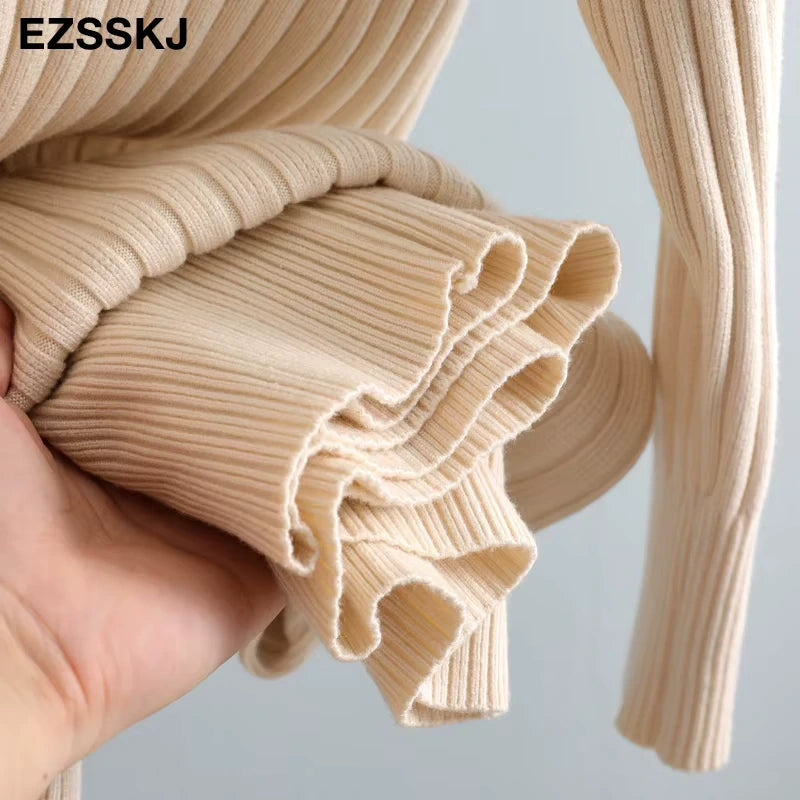 Ribbed knit detail of a women's turtleneck midi jumper dress in neutral shade — view 44 — view 49