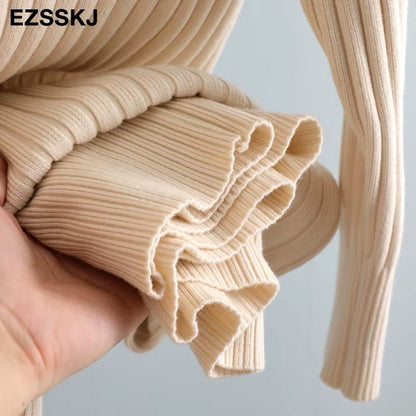 Ribbed knit detail of a women's turtleneck midi jumper dress in neutral shade — view 44 — view 49