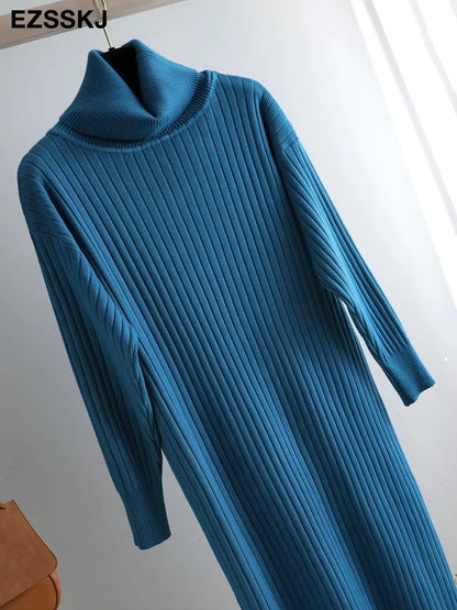 Blue straight knit midi jumper dress with turtleneck and long sleeves, hanging on display — view 46 — view 51