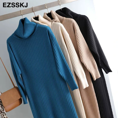 Midi jumper dress — Four women's turtleneck dresses in blue, beige, cream, and black hanging on a rail — view 3 — view 8