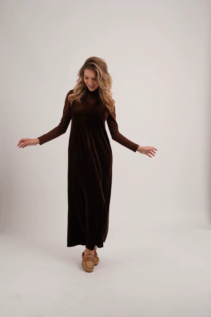 Women's V neck velvet midi jumper dress, long sleeves, relaxed fit, model standing — view 6 — view 10