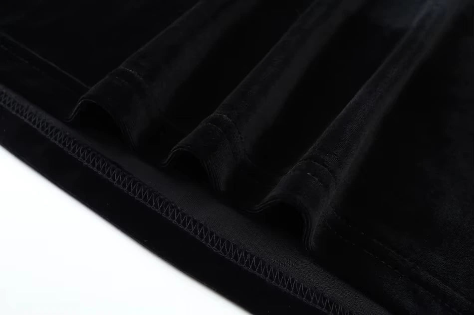 Close up of black velvet fabric on women's V neck midi jumper dress — view 19 — view 23