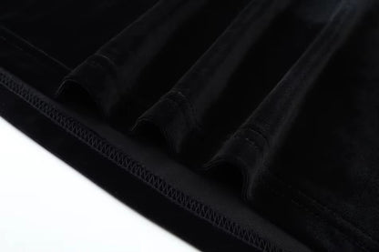 Close up of black velvet fabric on women's V neck midi jumper dress — view 19 — view 23
