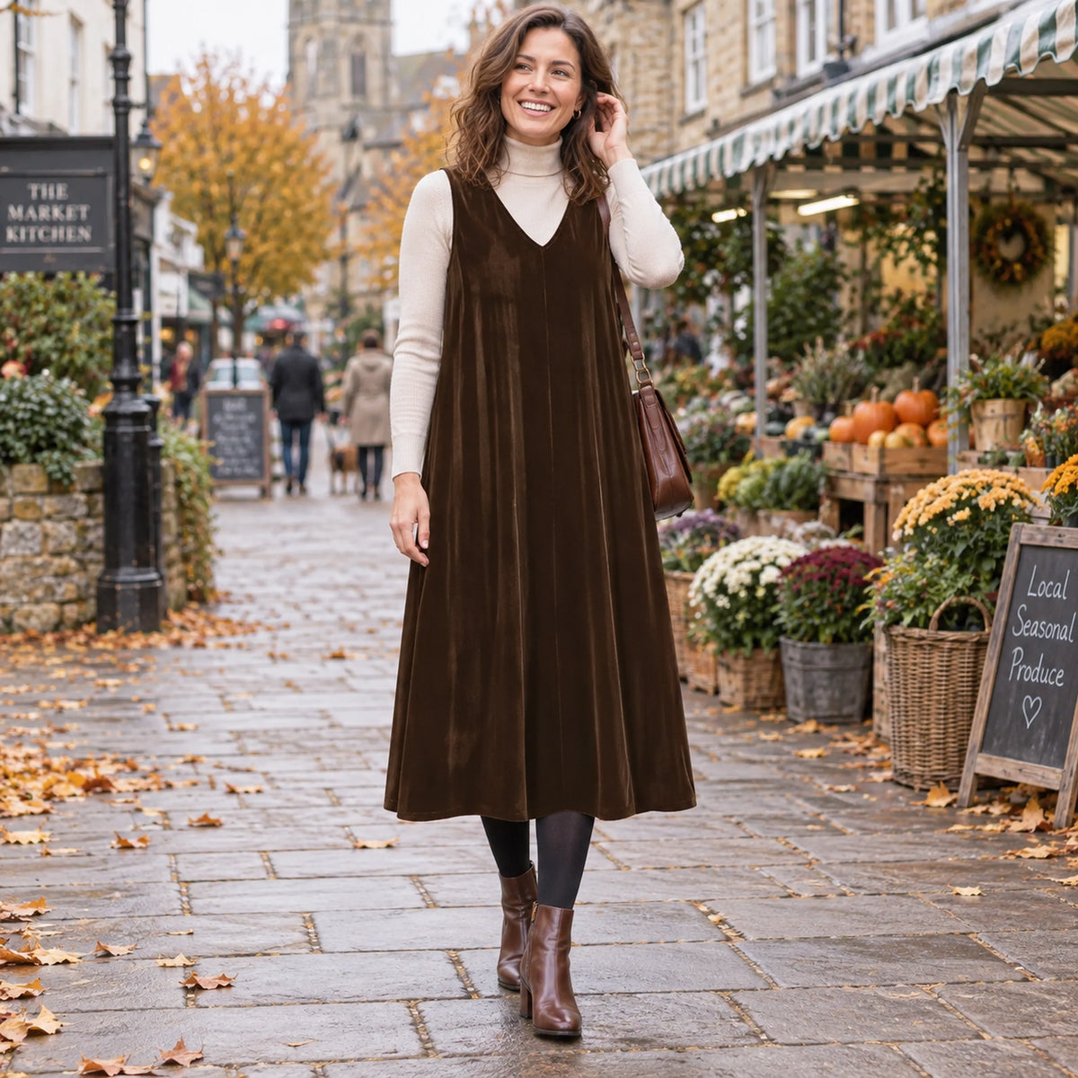 Women's V Neck Velvet Midi Jumper Dress in Brown worn by a happy model UK autumn setting — view 3