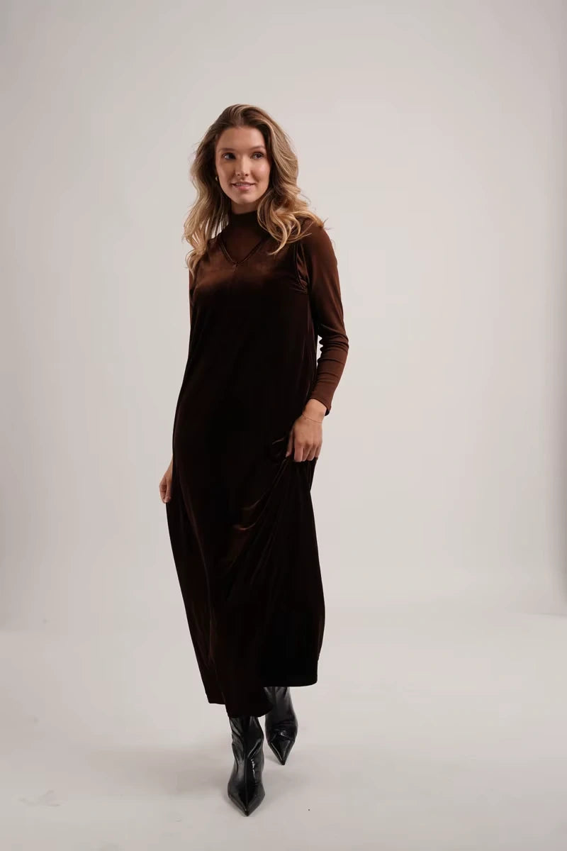 Women's V neck velvet midi jumper dress with long sleeves, model standing, neutral background — view 2 — view 6