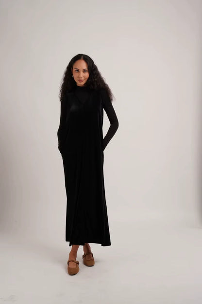 Women's V neck velvet midi jumper dress, full length view, with long sleeves and flowing silhouette — 3 — view 7