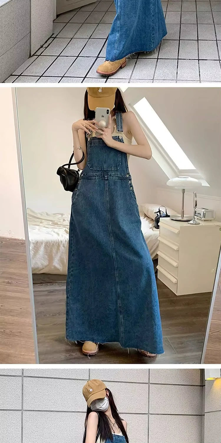 Denim midi jumper dress with adjustable straps and front pocket, shown in indoor setting — view 16 — view 17