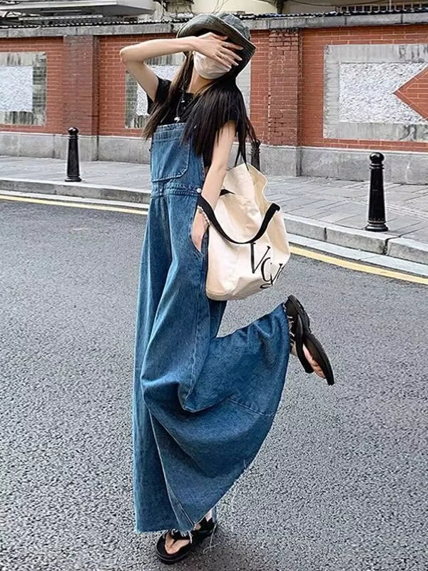Midi jumper dress — Denim overall style with wide legs and black sandals, outdoor setting — view 2