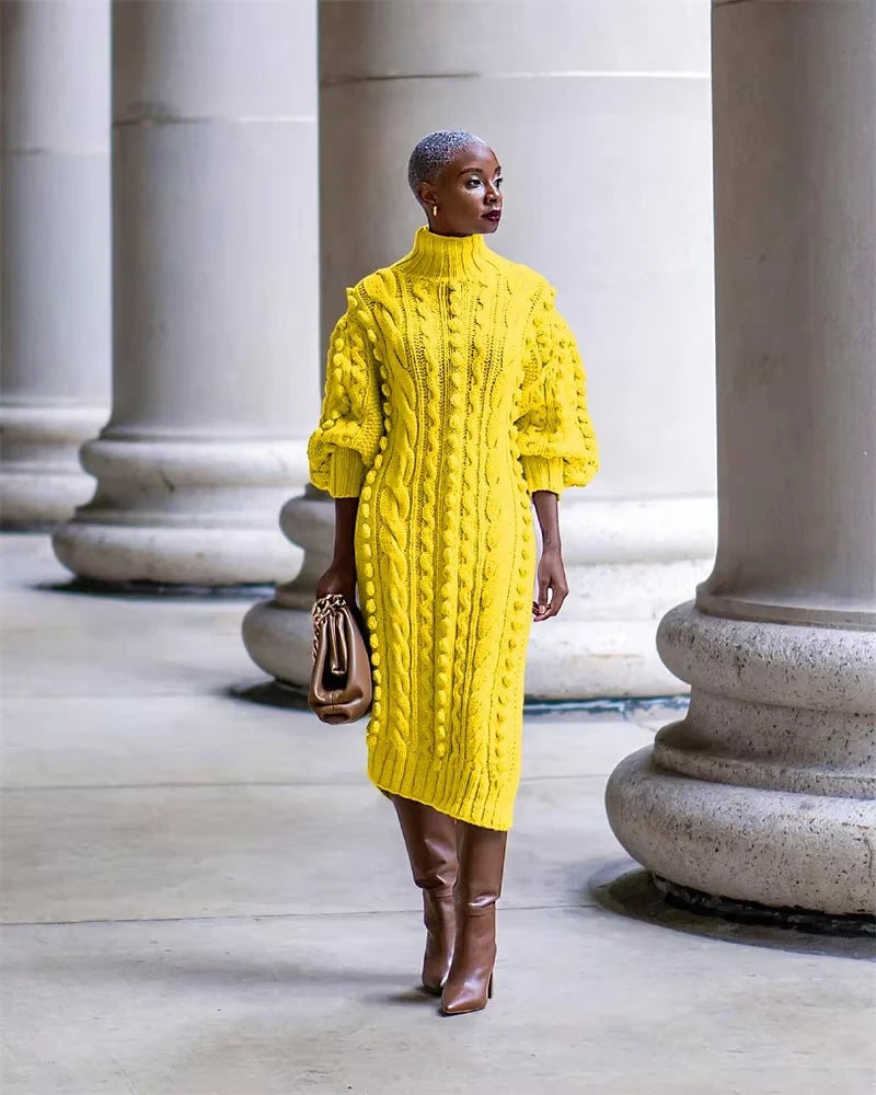 Yellow ribbed turtleneck midi jumper dress with cable knit design, worn brown boots — view 18 — view 23