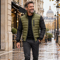 Jacket focused front view of the full Green Owen Quilted High Collar Daily worn by a happy adult model in UK autumn street