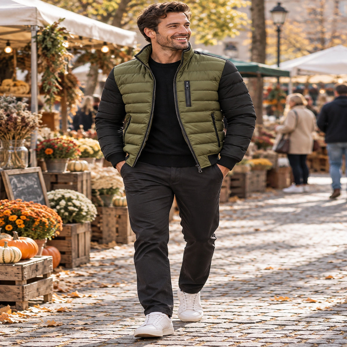 Happy younger male model wearing the full olive green and black Owen jacket at a UK autumn market — view 3