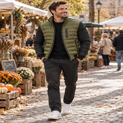 Happy younger male model wearing the full olive green and black Owen jacket at a UK autumn market — view 3