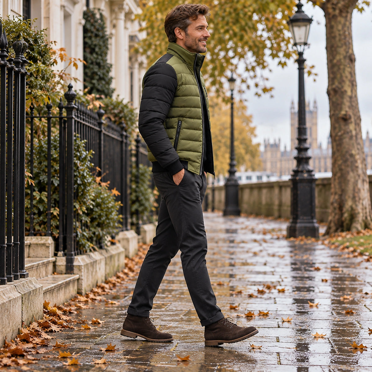 Side full length view of the Green garment worn by a happy adult model in cool UK autumn setting — view 4