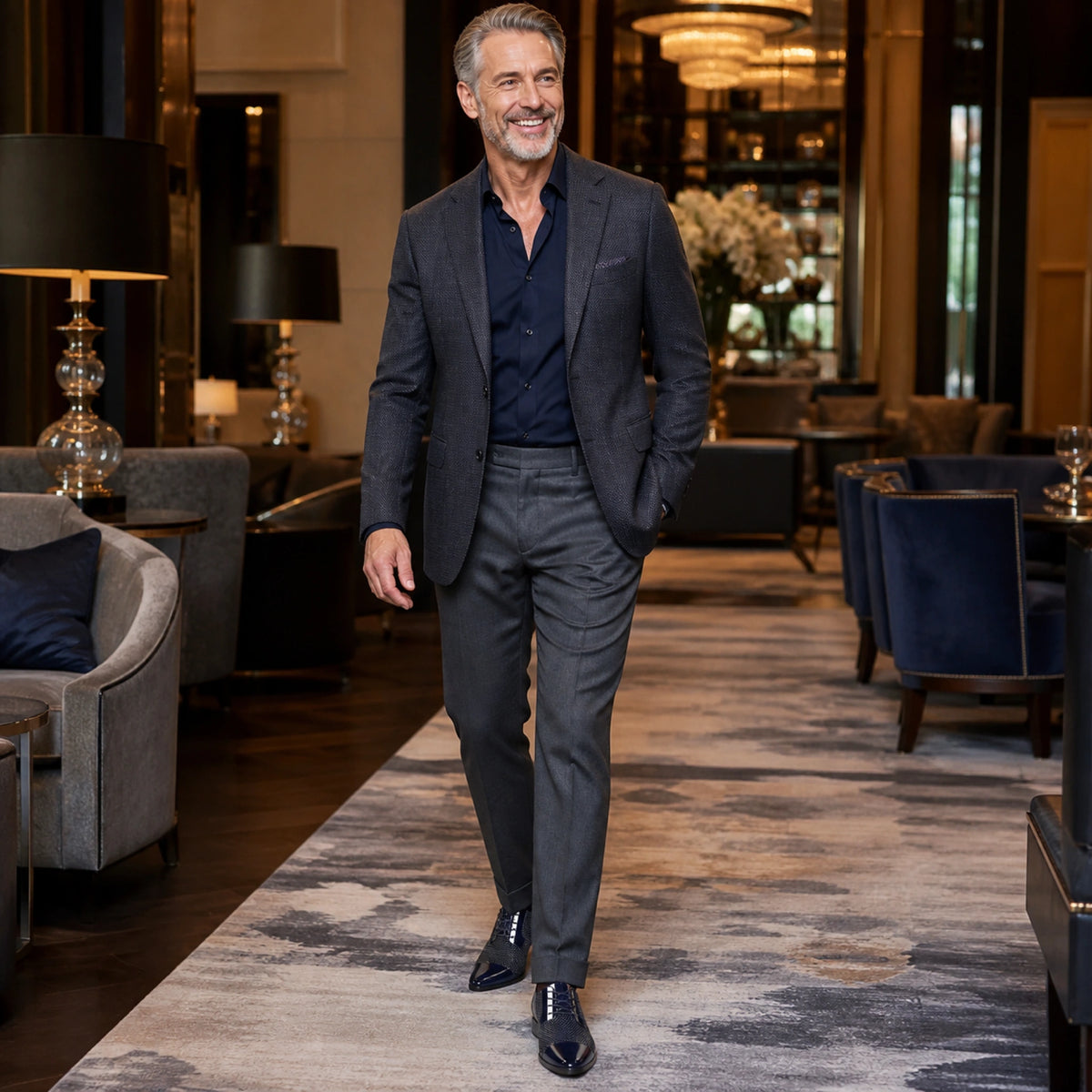 Mature man wearing navy blue textured Oxford shoes in a hotel — view 7