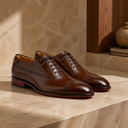 Dark brown perforated cap toe Oxford shoes complete pair view