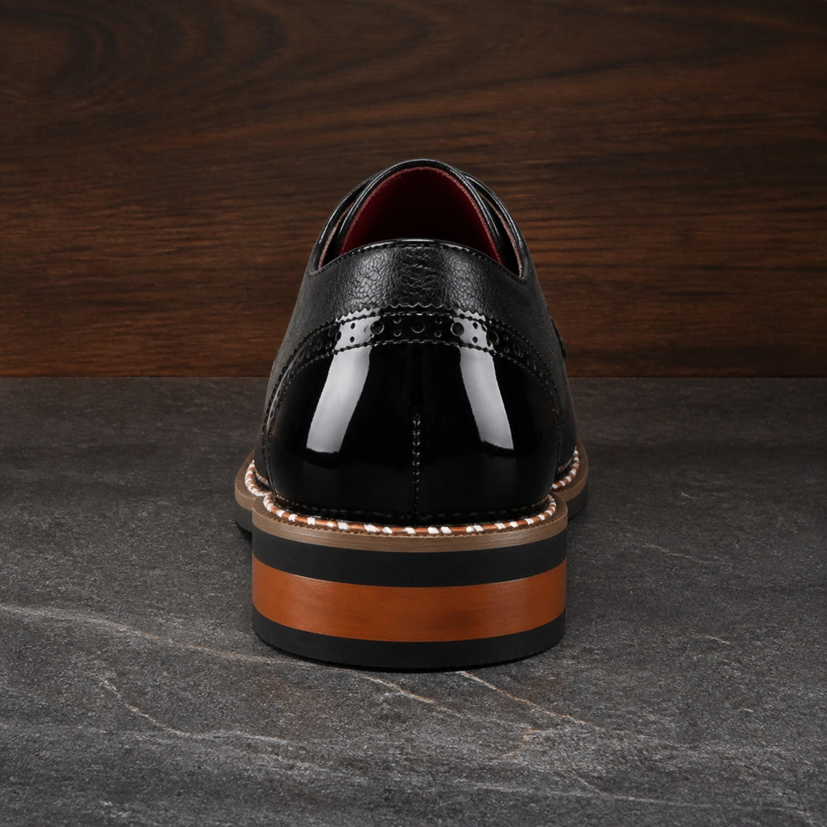 oxford shoes — Black wingtip Oxford shoe direct rear view — view 5