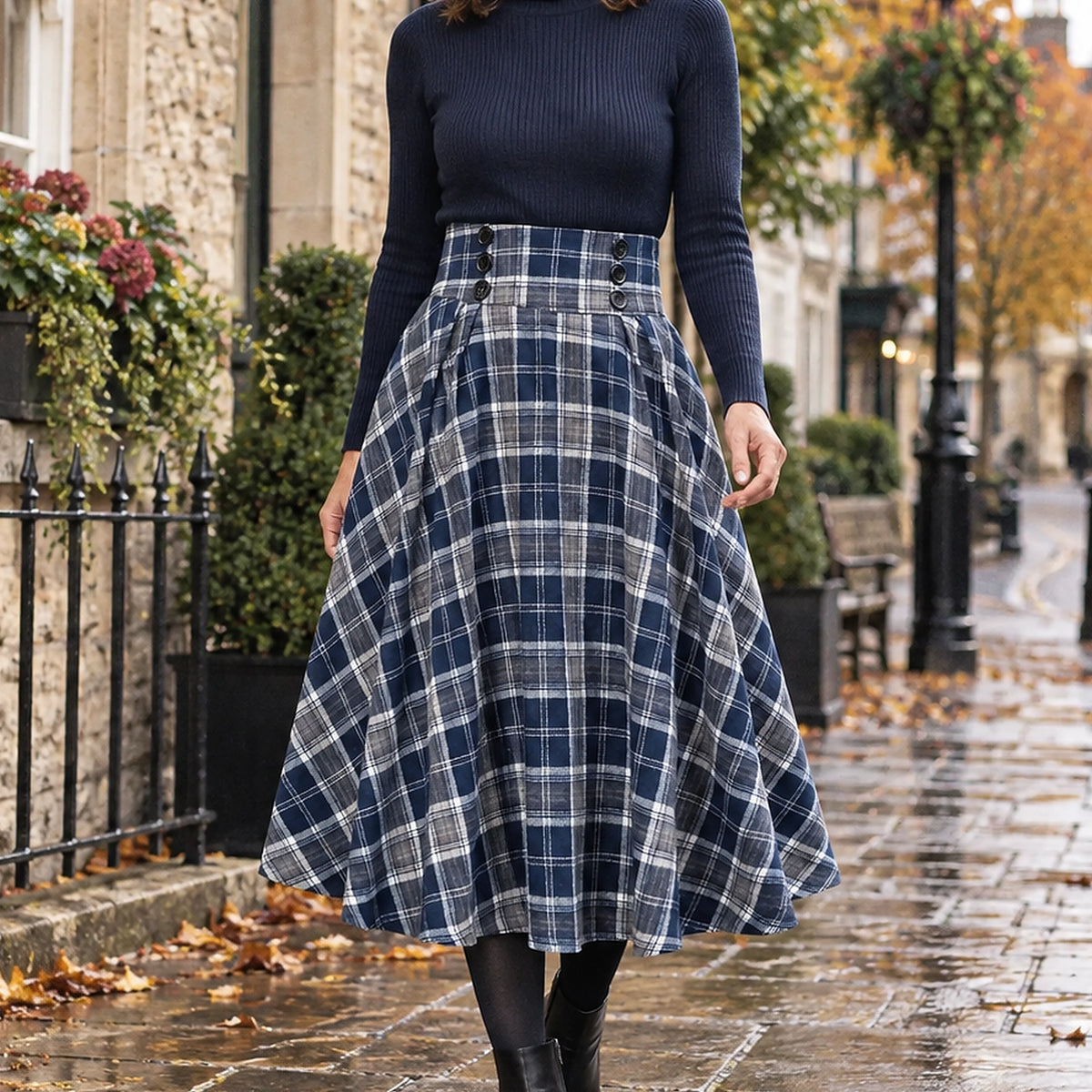 pleated skirt — Front view of the full Navy Plaid skirt worn by an adult model in a cool UK autumn street setting — view 4
