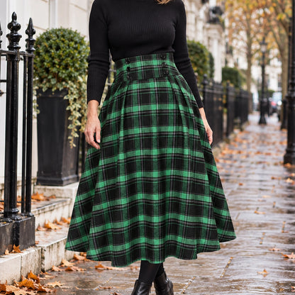 pleated skirt — Front view of the full Green Plaid skirt worn by an adult model in a cool UK autumn street setting — view 6