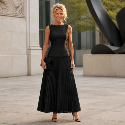 Black sleeveless shell and pleated skirt set complete front view — view 2