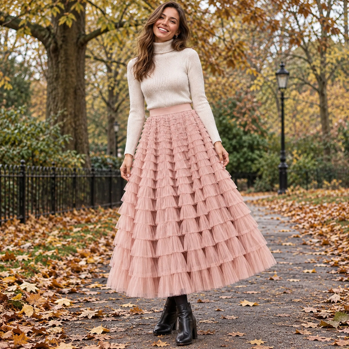 Front full length view of a happy model wearing the Pink Chloe High Waisted Layered Ruffle and Lace Pleated Skirt — view 10