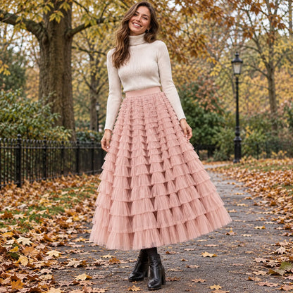 Front full length view of a happy model wearing the Pink Chloe High Waisted Layered Ruffle and Lace Pleated Skirt — view 10