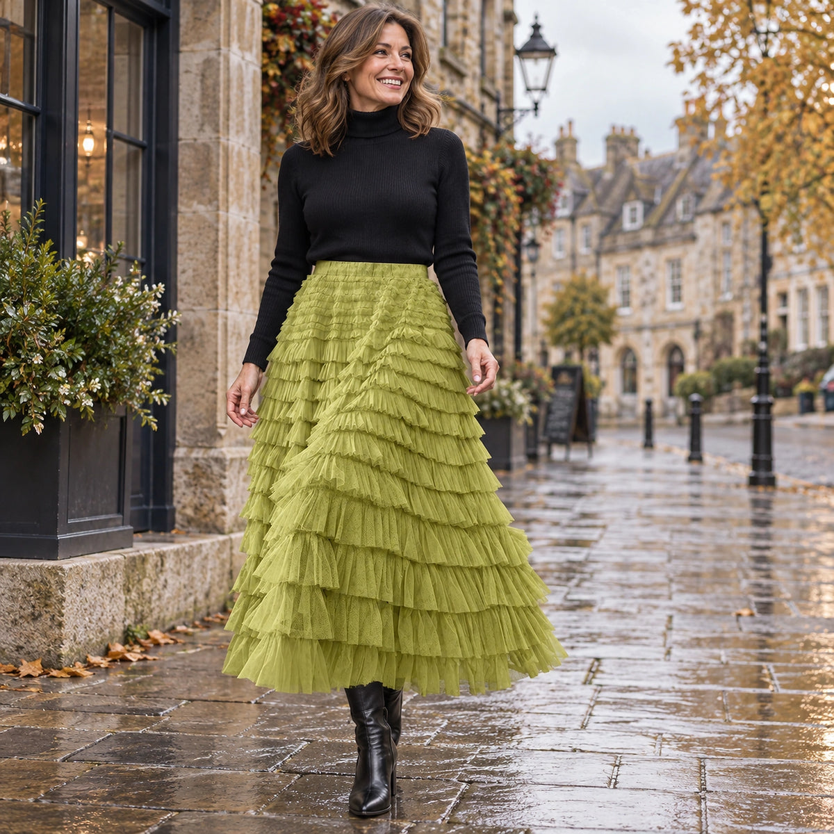 Front full length view of a happy model wearing the Green Chloe High Waisted Layered Ruffle and Lace Pleated Skirt — view 13