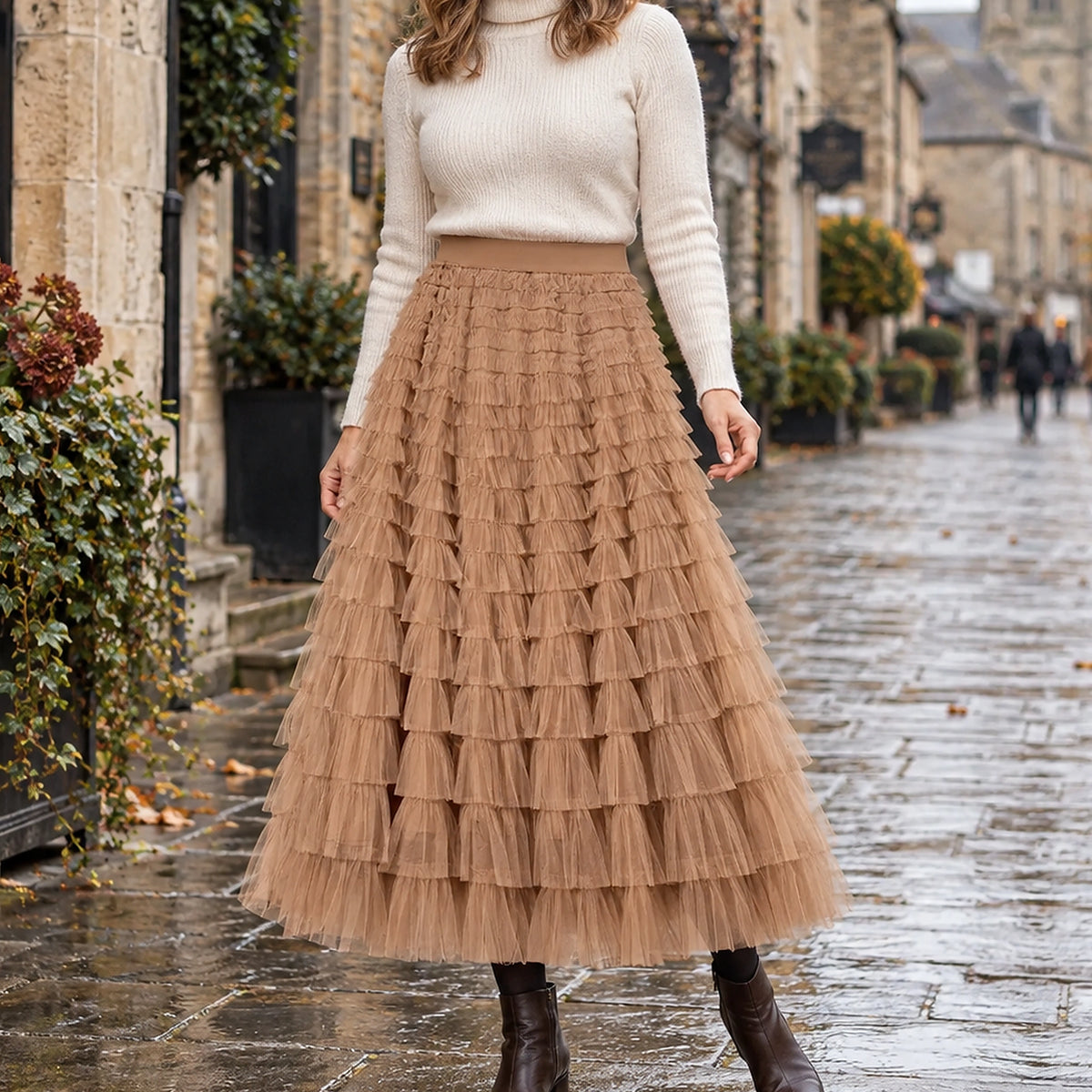 pleated skirt — Front view of the full Light Khaki skirt worn by an adult model in a cool UK autumn street setting — view 2