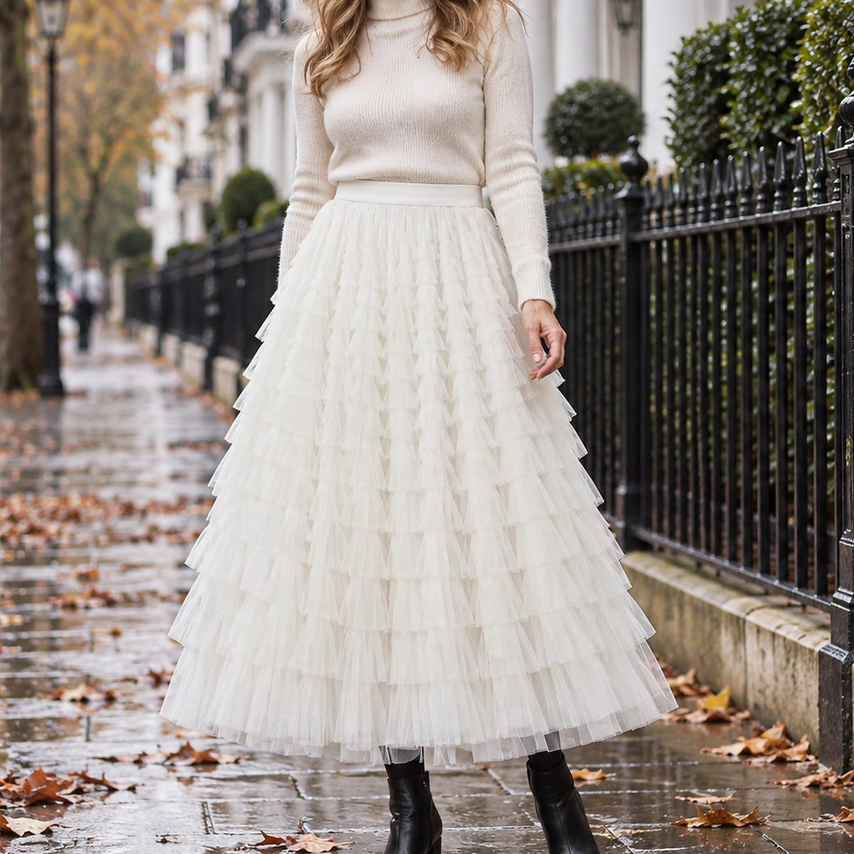 pleated skirt — Front view of the full White skirt worn by an adult model in a cool UK autumn street setting — view 4