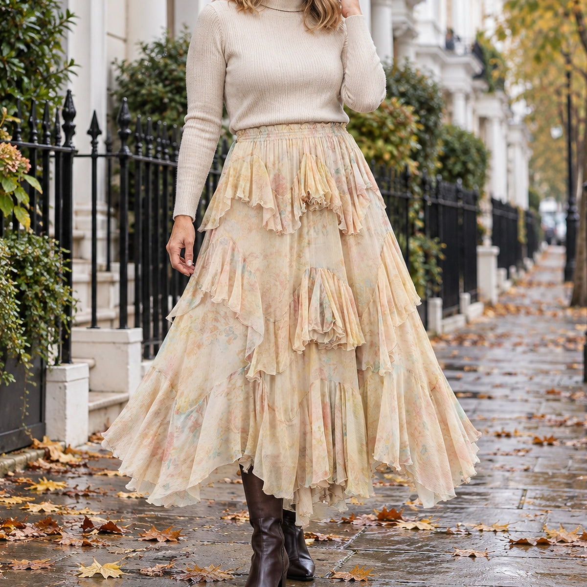 pleated skirt — Front view of the full Beige skirt worn by an adult model in a cool UK autumn street setting
