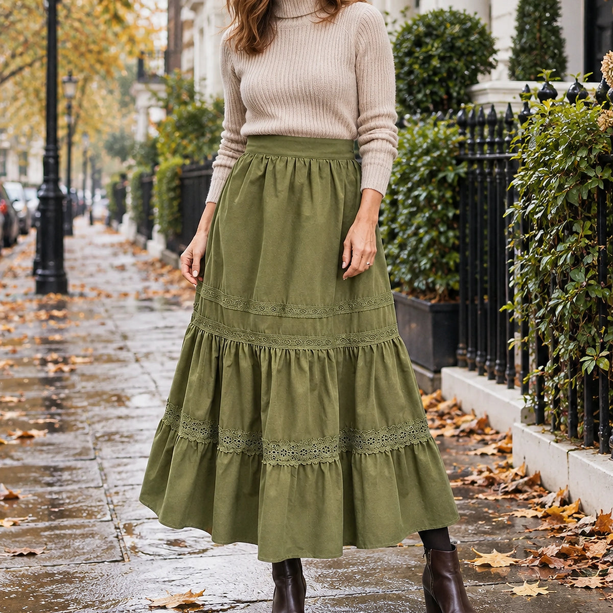 pleated skirt — Front view of the full Green skirt worn by an adult model in a cool UK autumn street setting — view 2