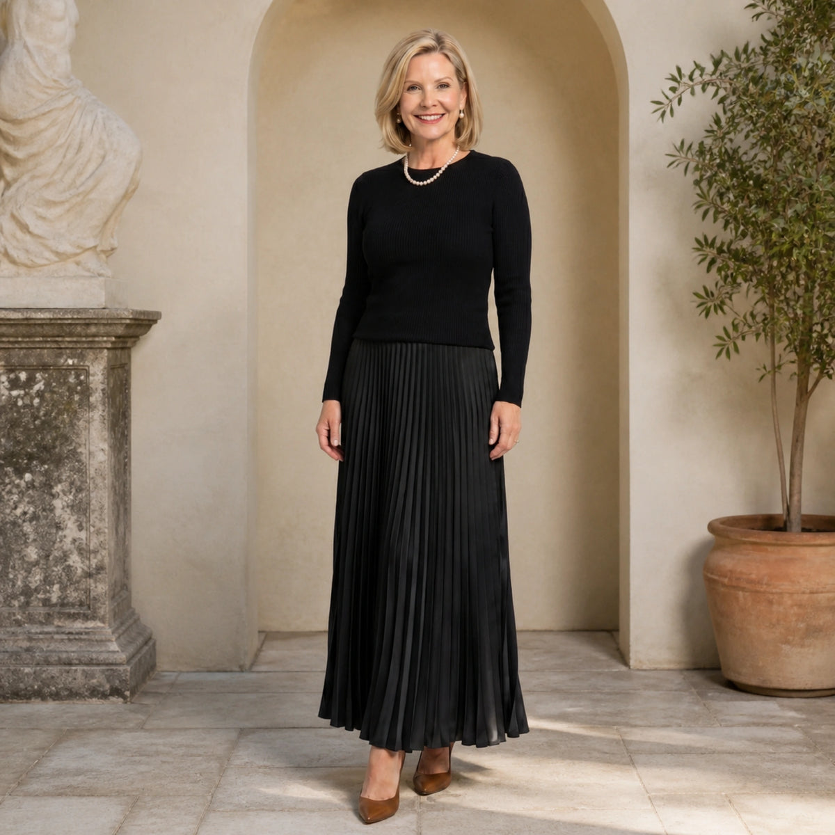 pleated skirt — Black rib knit top and pleated satin skirt set complete front view — view 3