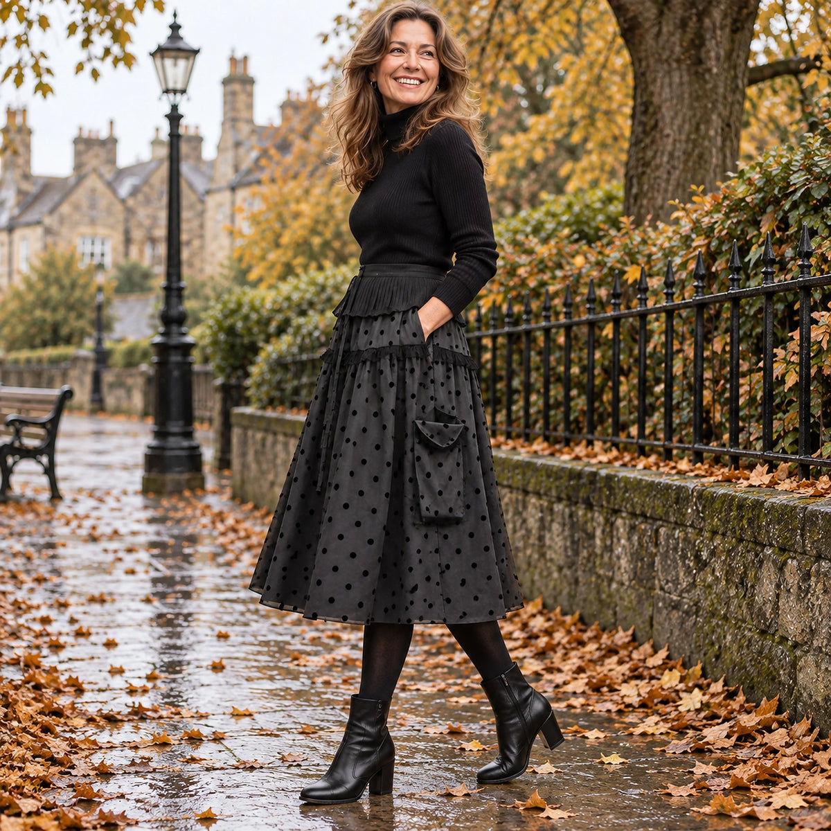pleated skirt — Side full length view of the Black Ruffle garment worn by a happy adult model in cool UK autumn — view 7