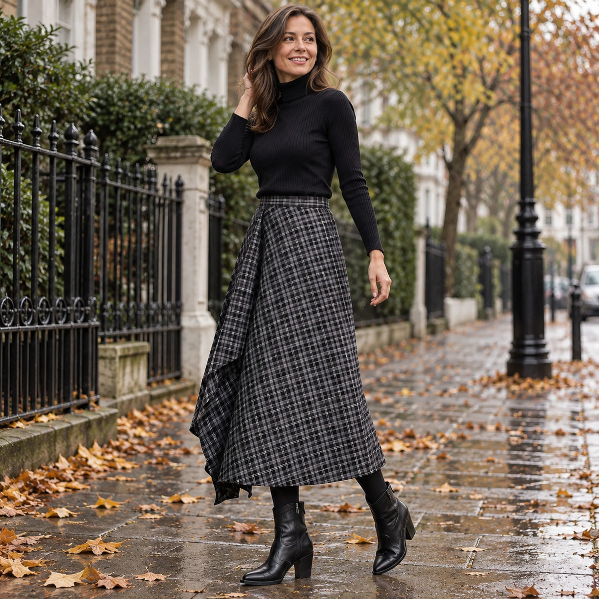 pleated skirt — Side full length view of the Black garment worn by a happy adult model in cool UK autumn setting — view 5