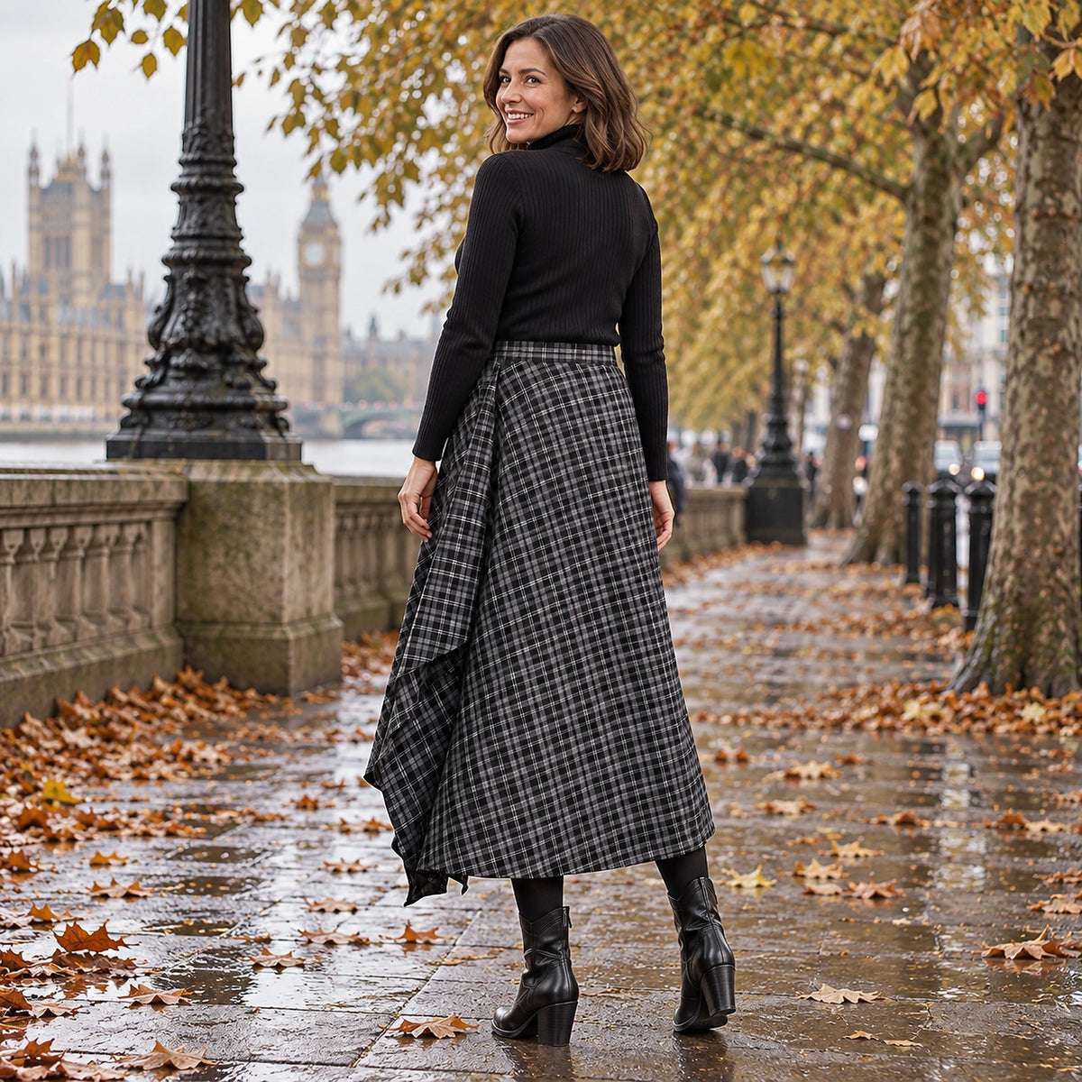 pleated skirt — Back full length view of the Black garment worn by a happy adult model in cool UK autumn setting — view 6