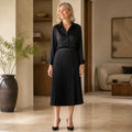 pleated skirt — Black satin accordion pleated midi skirt complete front view
