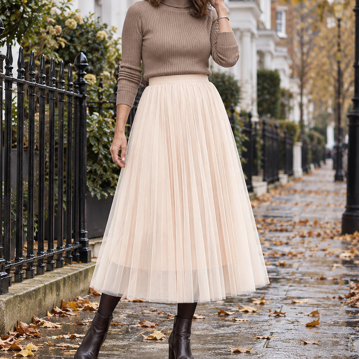 pleated skirt — Front view of the full Apricot 78 cm skirt worn by an adult model in a cool UK autumn street — view 10