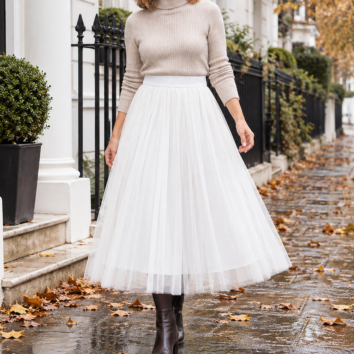 pleated skirt — Front view of the full White 78 cm skirt worn by an adult model in a cool UK autumn street setting — view 22