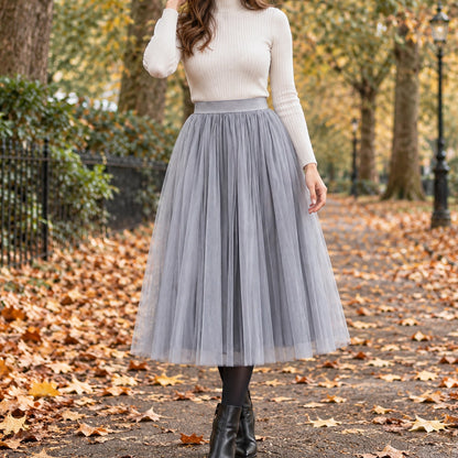 pleated skirt — Front view of the full Grey 68 cm skirt worn by an adult model in a cool UK autumn street setting — view 25