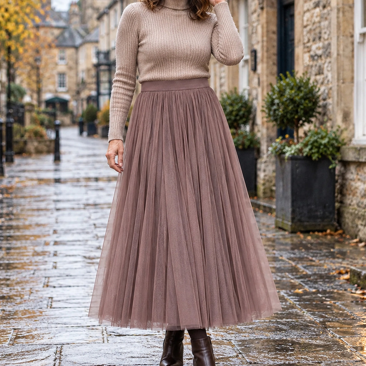 pleated skirt — Front view of the full Coffee 98 cm skirt worn by an adult model in a cool UK autumn street setting — view 4