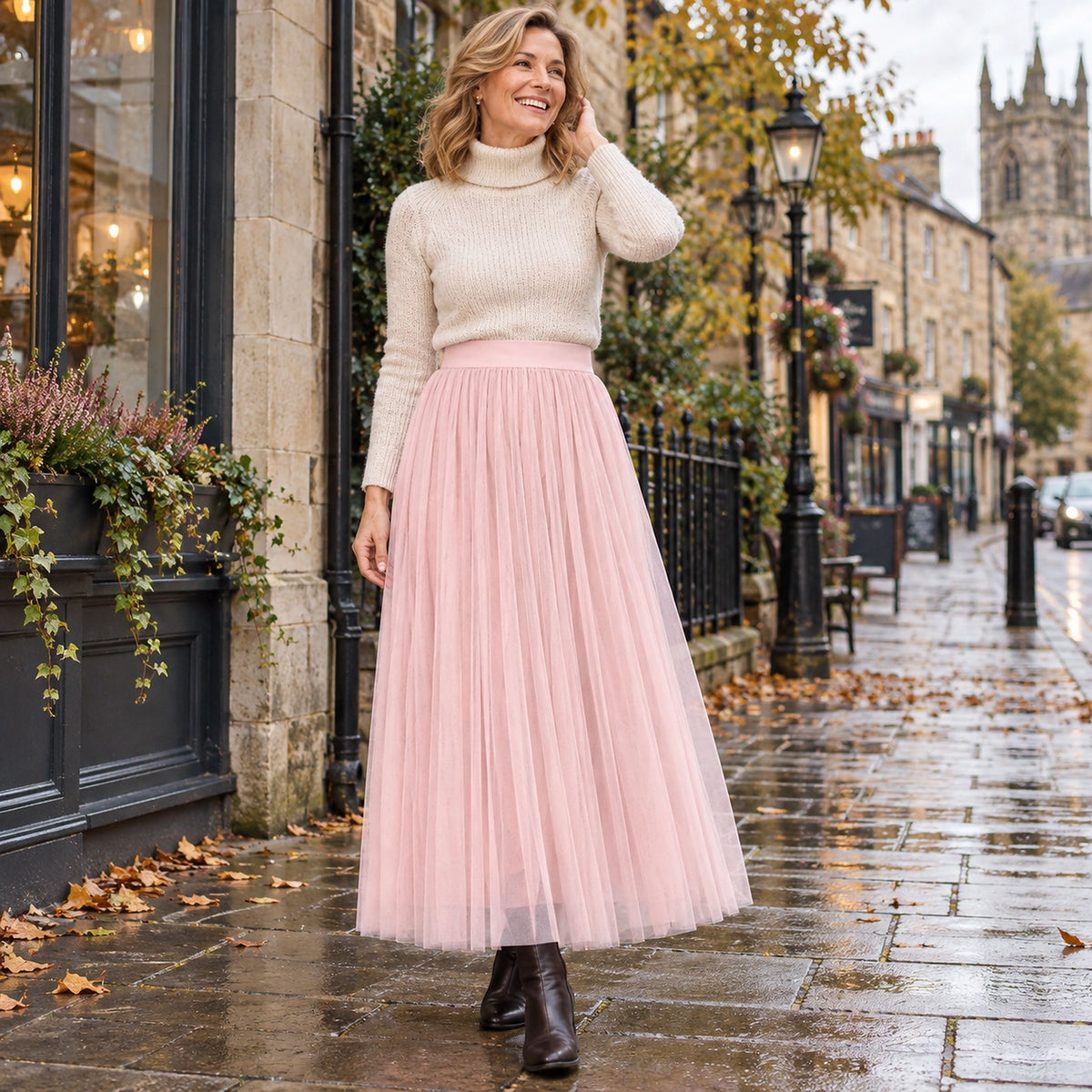 Happy adult model wearing the full Pink Violet High Waisted A Line Tulle Pleated Skirt in cool UK autumn setting — view 44