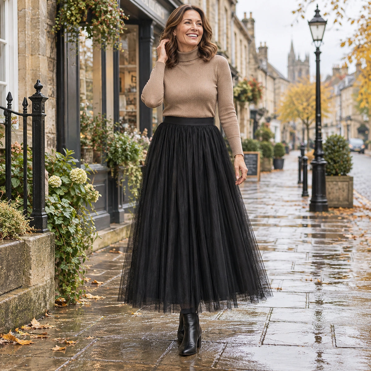 Happy adult model wearing the full Black Violet High Waisted A Line Tulle Pleated Skirt in cool UK autumn setting — view 48