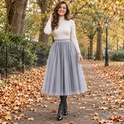 Happy adult model wearing the full Grey Violet High Waisted A Line Tulle Pleated Skirt in cool UK autumn setting — view 53