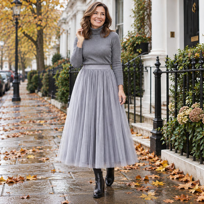 Happy adult model wearing the full Grey Violet High Waisted A Line Tulle Pleated Skirt in cool UK autumn setting — view 54
