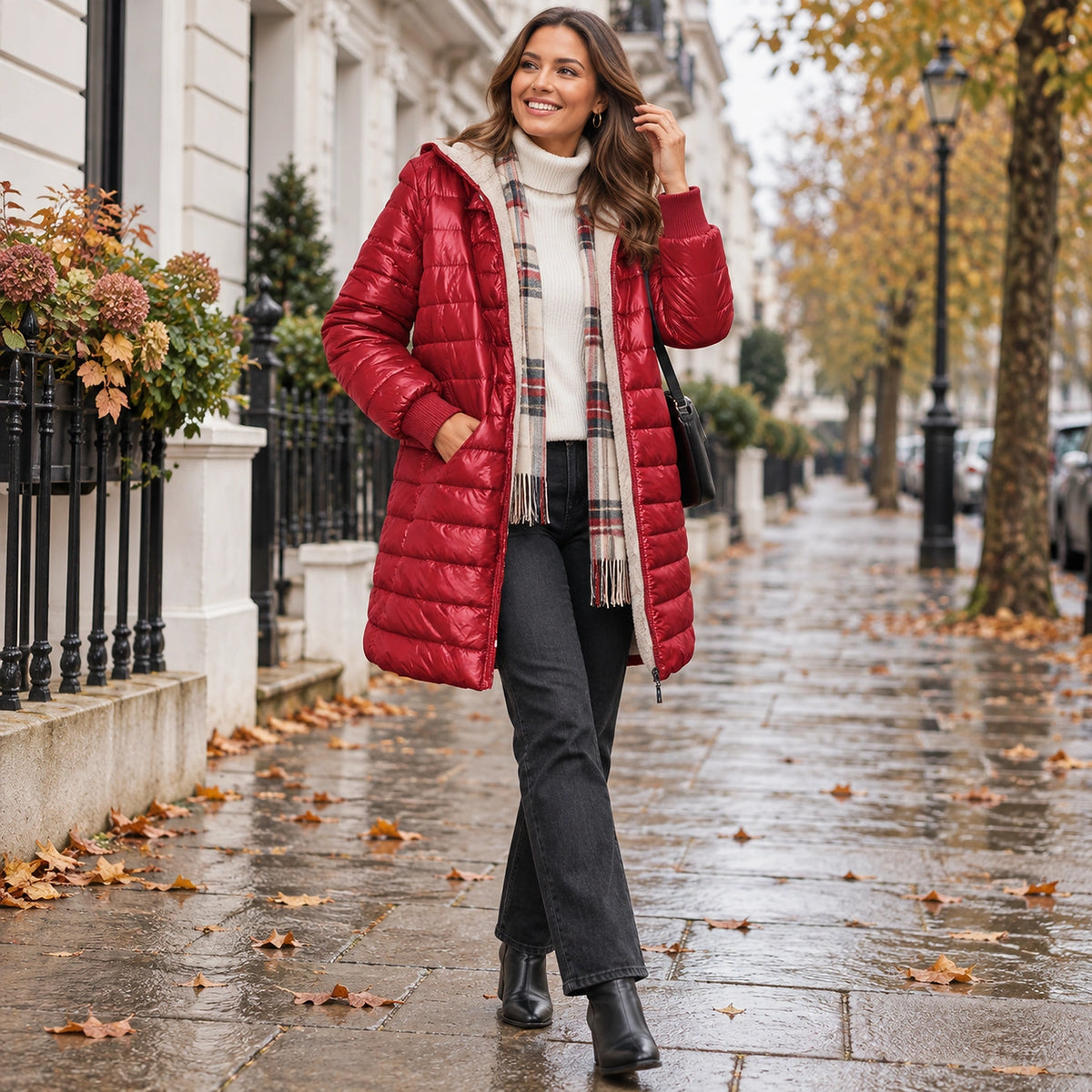 Happy adult model wearing the full Red Lily Hooded Ribbed Cuff Longline Puffer Jacket in a cool UK autumn setting — view 8