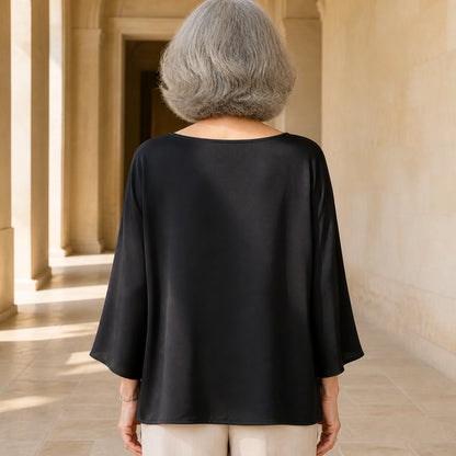 Black loose satin blouse direct rear view — view 8