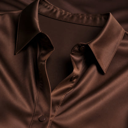 Brown satin blouse collar button and fabric detail — view 7