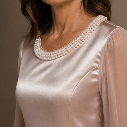 Blush pink satin blouse pearl neckline and fabric detail — view 7