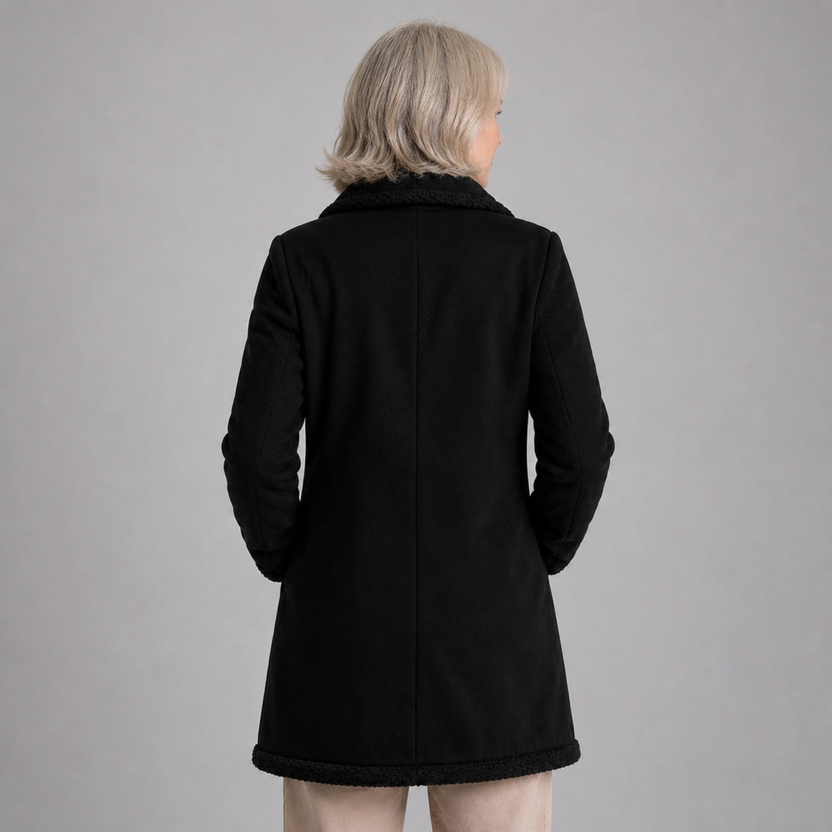 winter coat — Black shearling trim longline coat direct rear view — view 4